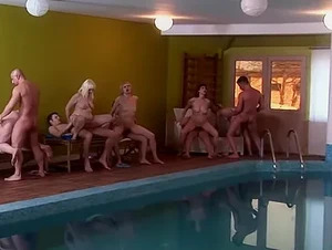 Marya, Judi and Odette in Eight mature women get eight hard cocks to munch on at the pool